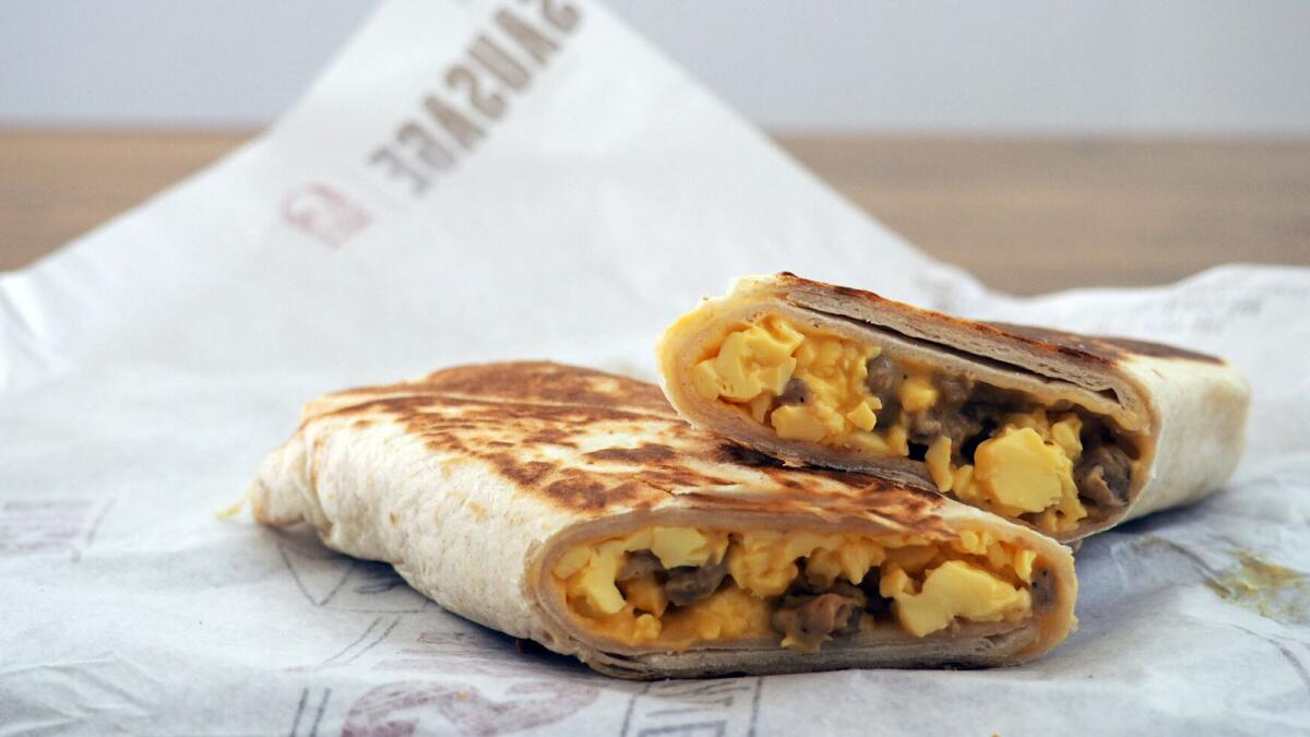 Grilled sausage breakfast burrito on the Taco Bell $1 breakfast menu.