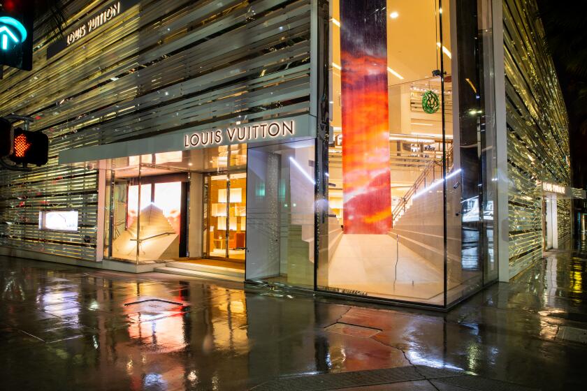 BEVERLY HILLS, CA --MARCH 22, 2020 -The two level Louis Vuitton store, on the famed Rodeo Drive, in the heart of Beverly Hills, CA, is quiet and looking empty, after closing under Gov. Gavin Newsom's order in response to the coronavirus, last week, photographed March 22, 2020. (Jay L. Clendenin / Los Angeles Times)