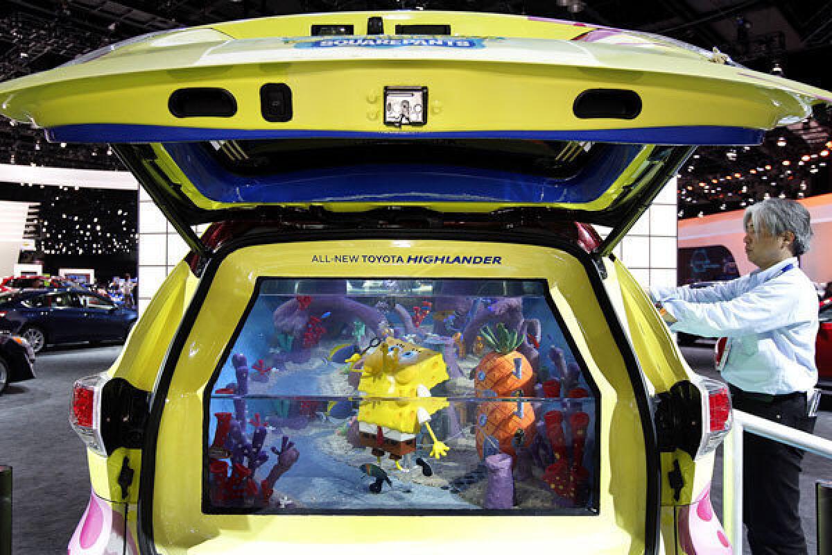 A 2014 Toyota Highlander converted into a "Spongebob Squarepants"-themed aquarium is on display at the L.A. Auto Show.