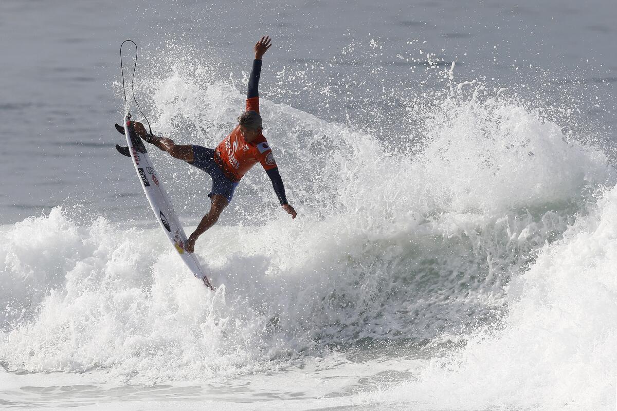 Kanoa Igarashi competes in Heat 1 against Brazil's Italo Ferreira during the World Surf League finals. 