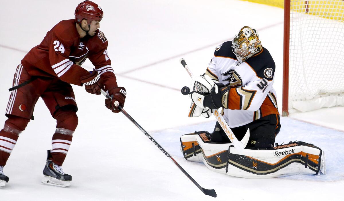Ducks goaltender Frederik Andersen stops a shot by Coyotes center Kyle Chipchura in the third period Tuesday night.