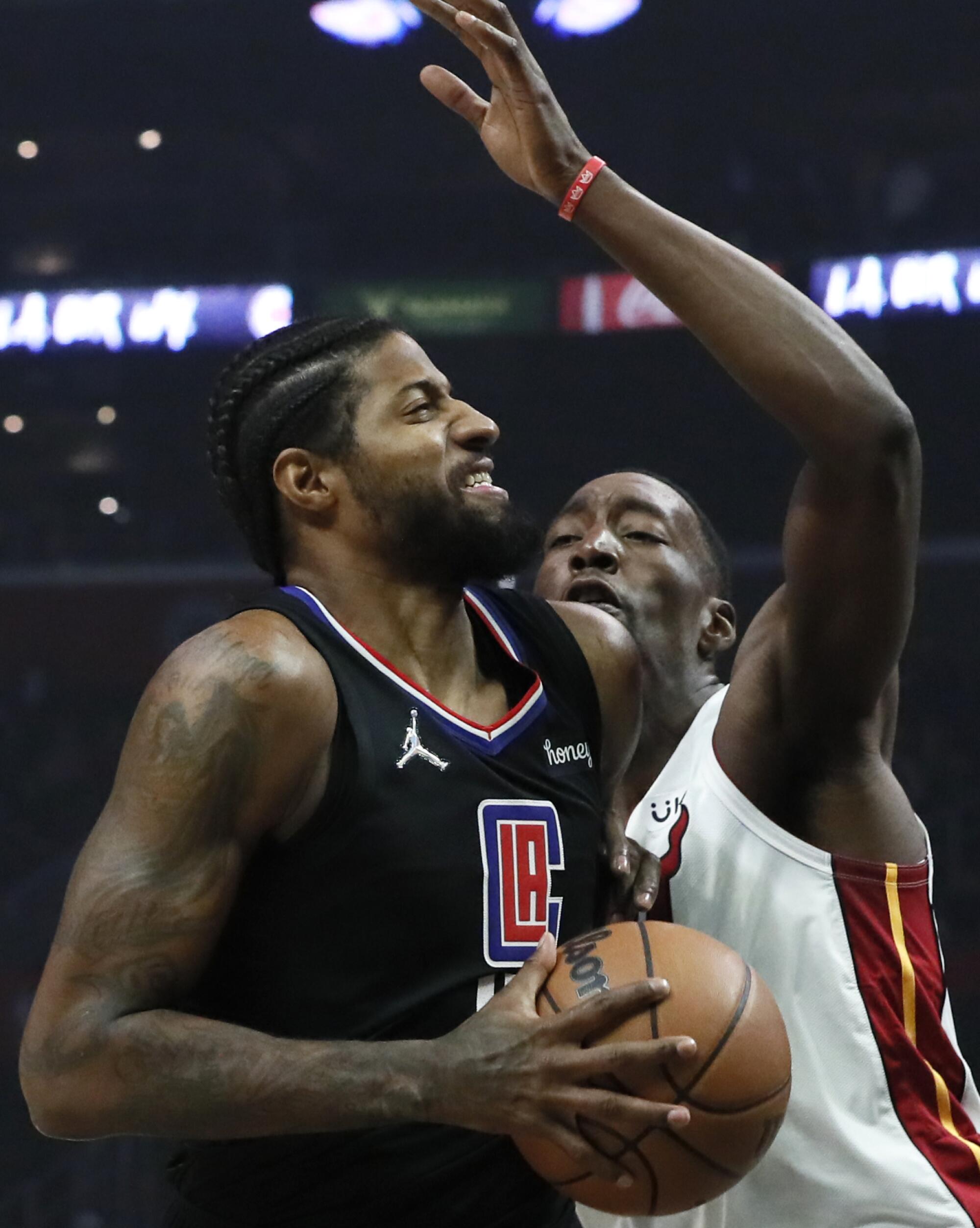 Paul George of the LA Clippers handles the ball against the Dallas