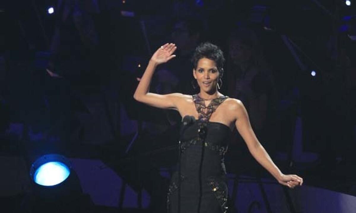 Halle Berry tapes a salute to Whitney Houston last year at the Nokia Theater in Los Angeles.