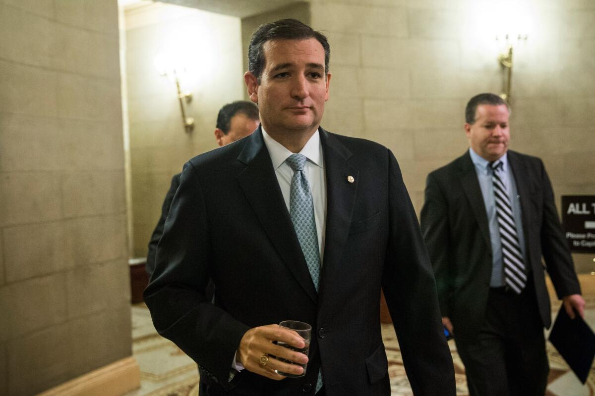 Sen. Ted Cruz (R-Texas) leaves the Senate chamber after speaking Wednesday. Cruz was one of the leading advocates of shutting down the government in an attempt to defund the 2010 healthcare law, an effort that proved futile.