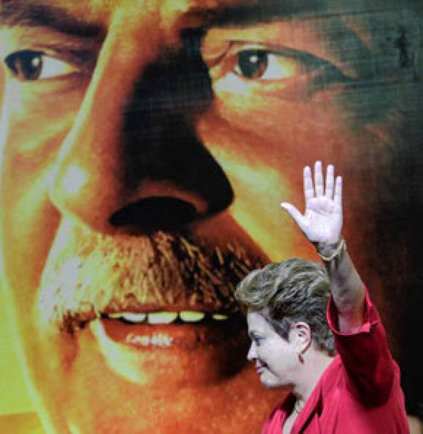 Brazilian President Dilma Rousseff helps mark 10 years in power of the Workers' Party, or PT, during a celebration in Sao Paulo last month.