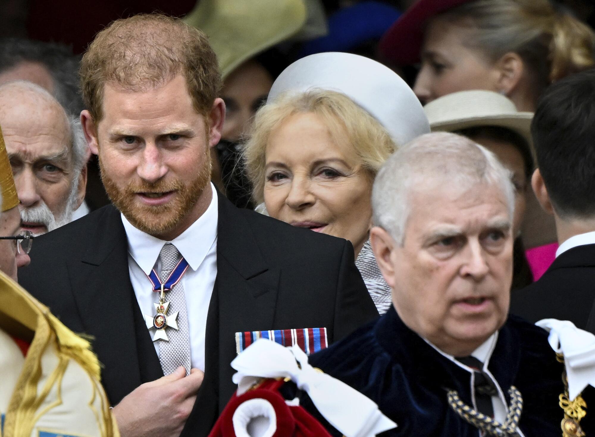 Britain's Prince Harry, Duke of Sussex, and Prince Andrew leave Westminster Abbey
