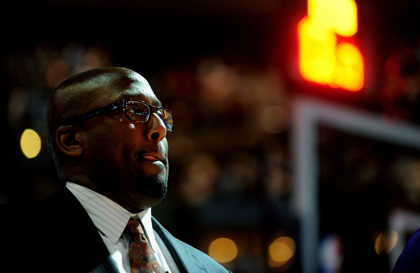 Mike Brown listens to the national anthem before a playoff game against the Nuggets last season in Denver. After eliminating the Nuggets, the Lakers lost to the Okahoma City Thunder in the Western Conference semifinals in five games.
