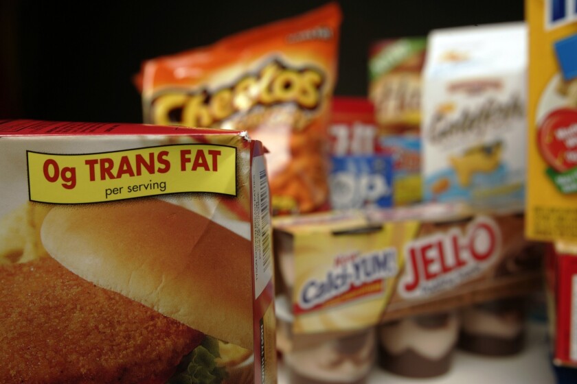 The U.S. Food and Drug Administration proposed a rule that would virtually eliminate all trans fat from processed foods. Above, food products shown with labeling indicating trans fat levels.
