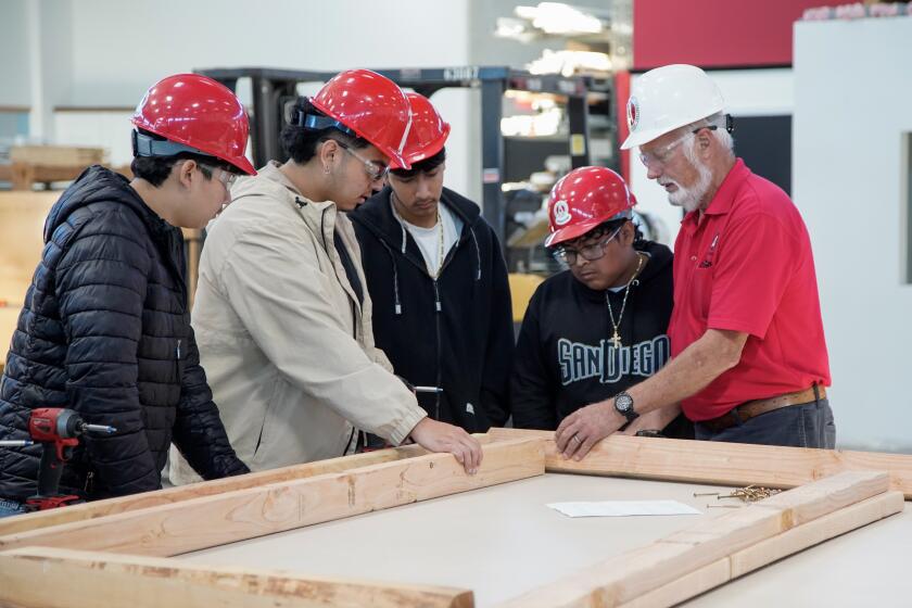 San Diego, California - April 11: John Hill, instructor teaching wood framing to a group of King-Chavez Community High School students in Lakeside on Thursday, April 11, 2024 in San Diego, California. (Alejandro Tamayo / The San Diego Union-Tribune)