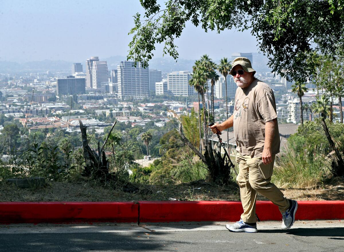 David Eisenberg stands on the 200 block of Wonderview Dr., in Glendale. He's been an avid walker in Glendalefor about 12 years and believes he's planted his feet on about 90% of the city's streets to date.