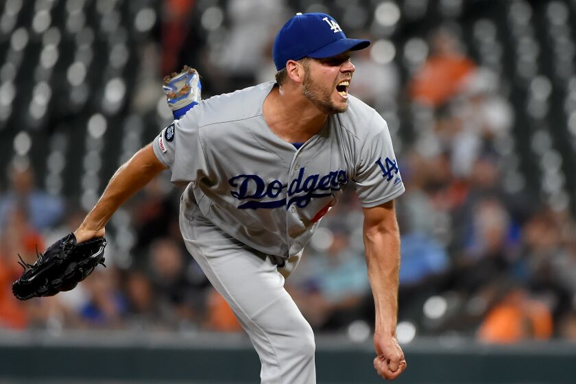 BALTIMORE, MD - SEPTEMBER 12: Rich Hill #44 of the Los Angeles Dodgers pitches during the first inning against the Baltimore Orioles at Oriole Park at Camden Yards on September 12, 2019 in Baltimore, Maryland. (Photo by Will Newton/Getty Images)