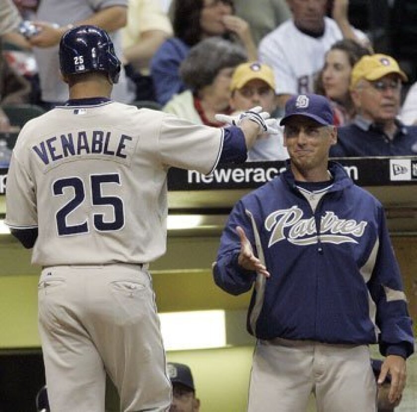 Will Venable is congratulated by manager Bud Black after hitting a home run against the Milwaukee Brewers last week. Black mentioned the center fielder as one of his "pleasant surprises" for the season. Morry Gash/AP Photo