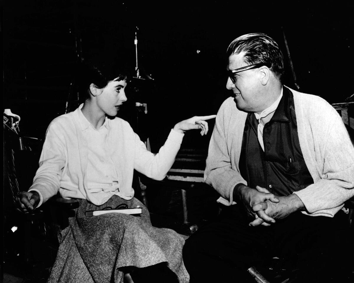 Millie Perkins who played Anne Frank, and director George Stevens on the set of "The Diary Of Anne Frank."