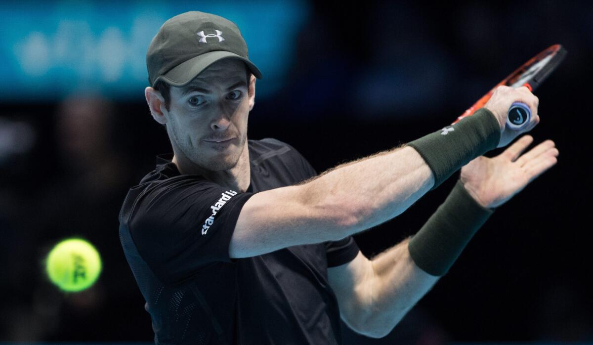 Andy Murray returns a shot during his semifinal match against Milos Raonic at the ATP World Tour Finals on Saturday.