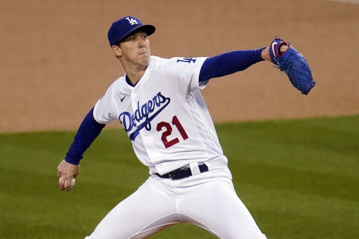 Los Angeles Dodgers starting pitcher Walker Buehler throws to the San Diego Padres.