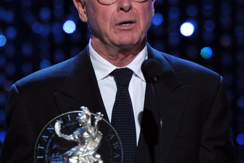 Director Tony Scott accepts the Britannia Award for Worldwide Contribution to Filmed Entertainment at the Hyatt Regency Century Plaza in 2010.
