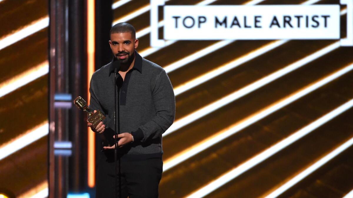 Drake accepts an award. (Chris Pizzello / Invision/Associated Press)