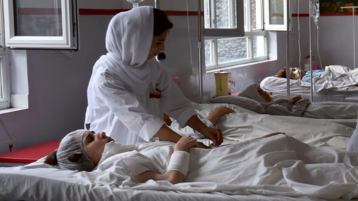 Wounded students from the American University of Afghanistan receive treatment at a hospital in Kabul following the attack on the school on Aug. 25, 2016. (Wakil Kohsar / AFP/Getty Images)