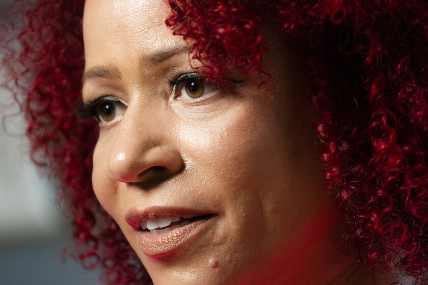 Nikole Hannah-Jones is interviewed at her home in the Brooklyn borough of New York, Tuesday, July 6, 2021. Hannah-Jones says she will not teach at the University of North Carolina at Chapel Hill following an extended fight over tenure. (AP Photo/John Minchillo)