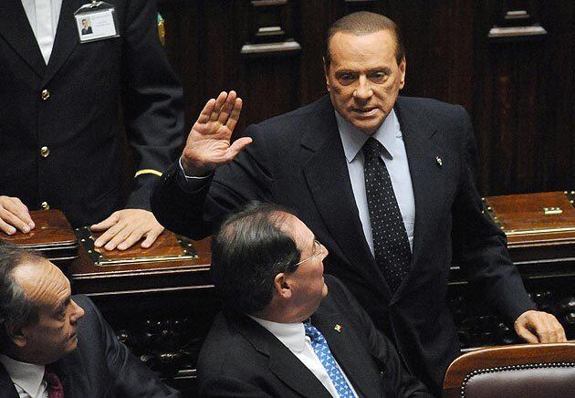 Berlusconi resigns