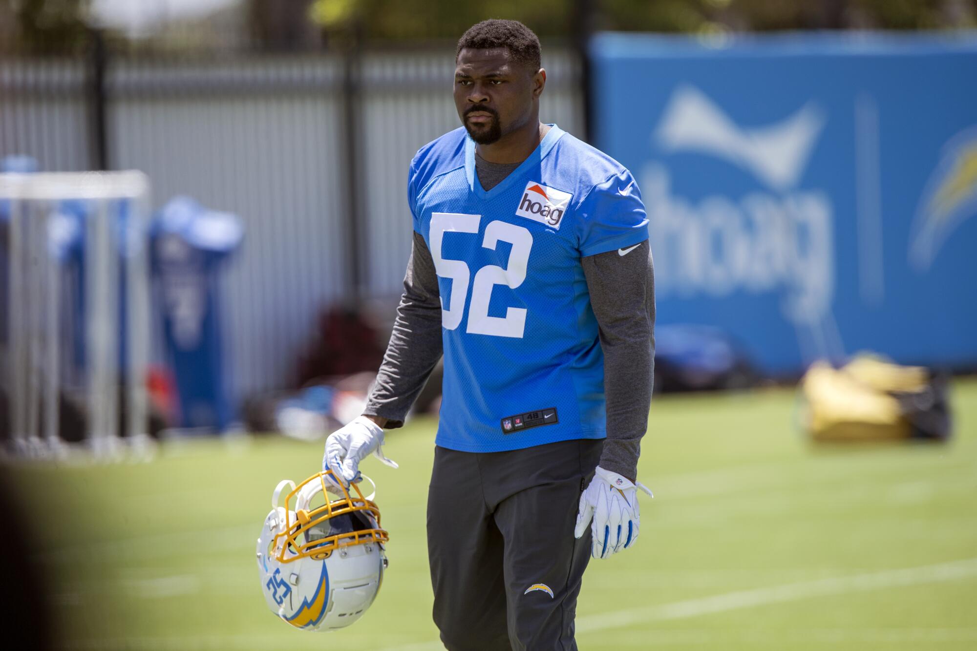 Khalil Mack walks off the field after running drills at the Chargers' practice facility in Costa Mesa on June 1.