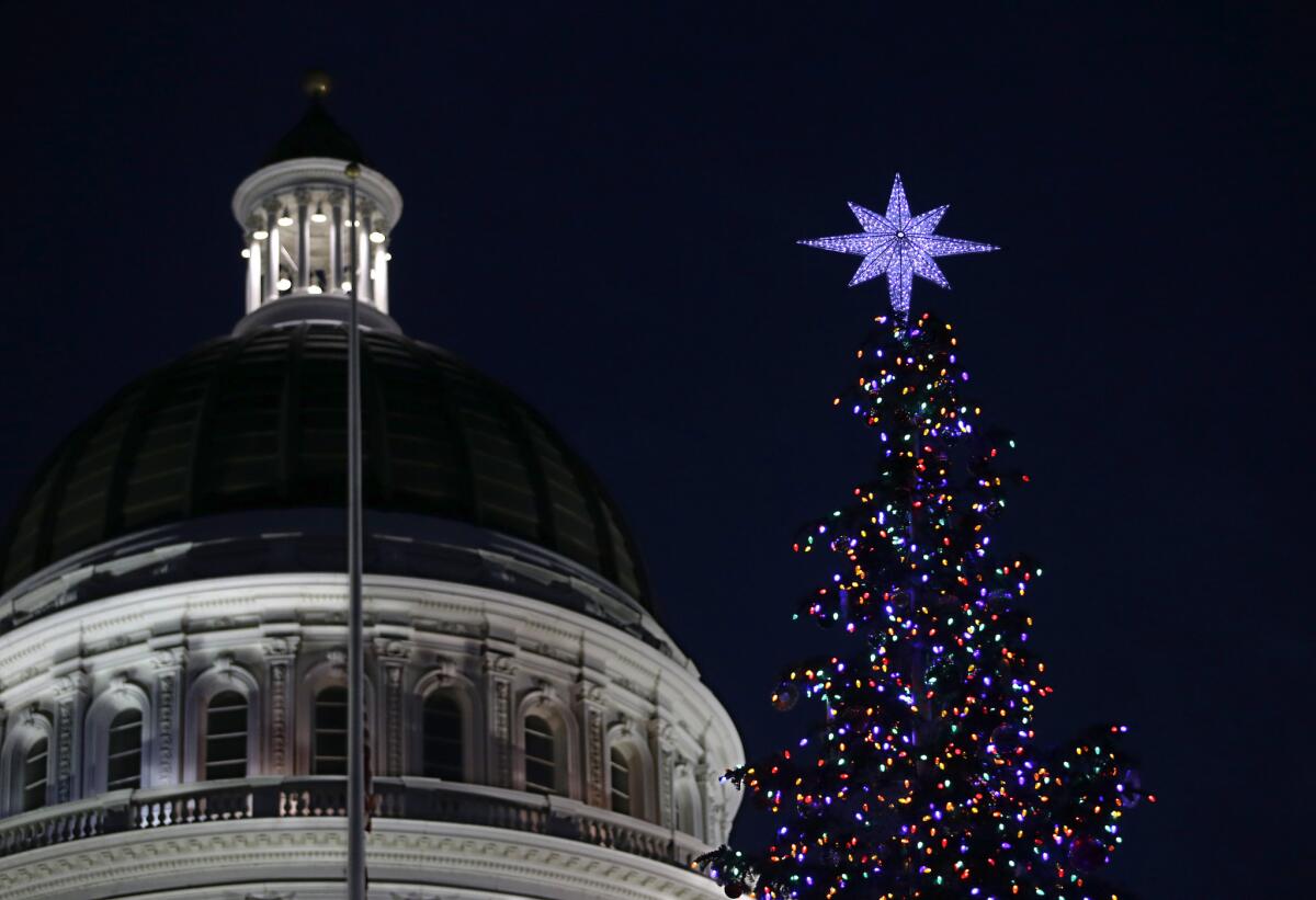 Lights from the Capitol Christmas tree glow in Sacramento.