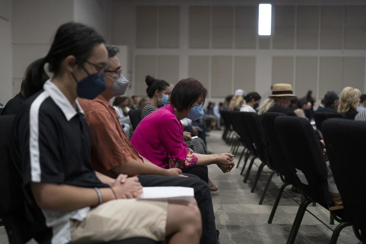 People praying during vigil for victims of church shooting