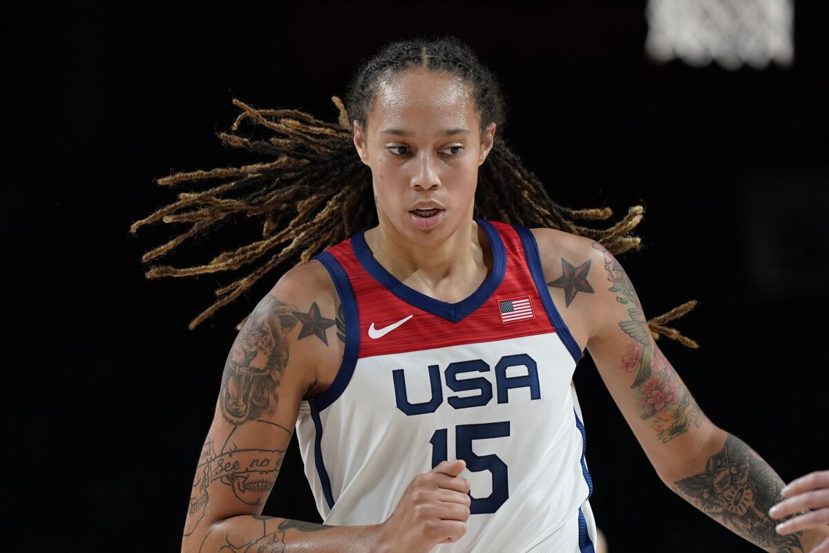 FILE - United States' Brittney Griner (15) plays during a women's basketball preliminary round game against Japan at the 2020 Summer Olympics, Friday, July 30, 2021, in Saitama, Japan. Griner went to Russia to earn extra money. But the experience has turned into a prolonged nightmare after she was arrested in February by police who reported finding vape cartridges allegedly containing cannabis oil in her luggage. She is awaiting trial on charges that could bring a prison term.(AP Photo/Eric Gay, File)