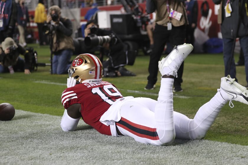 San Francisco 49ers wide receiver Deebo Samuel celebrates after scoring against the Los Angeles Rams during an NFL football game in Santa Clara, Calif., Monday, Nov. 15, 2021. (AP Photo/Jed Jacobsohn)