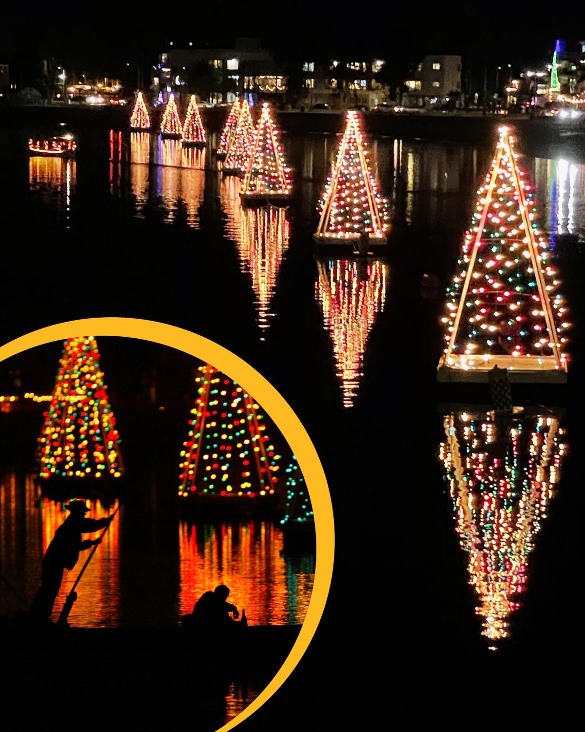 Wooden, lighted Christmas trees on the water
