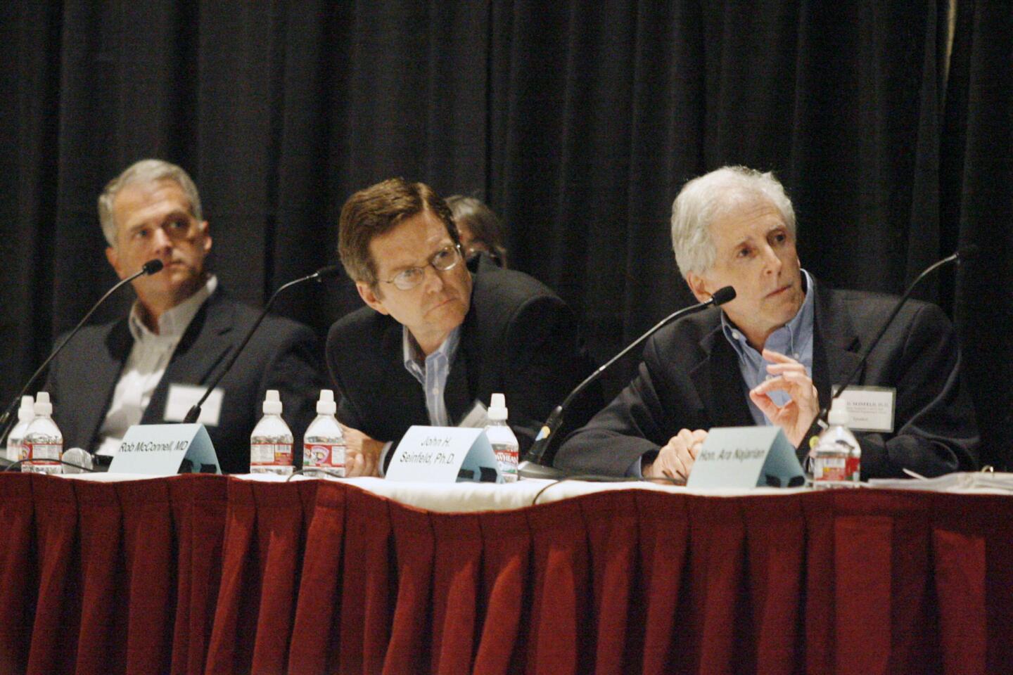 Dr. John Seinfeld, right, attends a panel discussion about the 710 freeway extension, which took place at the Pasadena Convention Center on Tuesday, September 18, 2012.