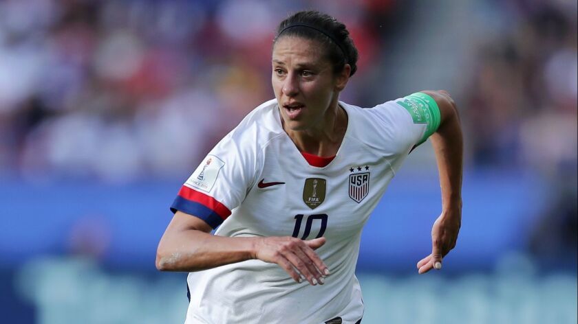 U.S. forward Carli Lloyd runs during the team's victory over Chile in the Women's World Cup on Sunday. Lloyd has thrived in the Women's World Cup, scoring in a record six consecutive games dating to the 2015 tournament.