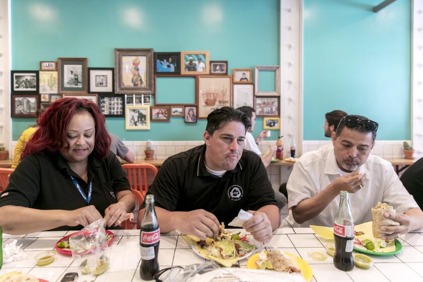 LOS ANGELES, CALIFORNIA - APR. 19, 2019: Customers enjoy their lunch as Sonoratown taqueria fills up during a lunch rush on Friday, Apr. 19, 2019, in downtown Los Angeles. Sonoratown's co-owners Jennifer Feltham and her partner Teodoro Diaz-Rodriguez, Jr. opened the small but very popular taqueria three years ago, and, in the style of San Luis Ro Colorado, Sonora region of Northern Mexico, they focused on well-prepared carne asada and buttery flour tortillas. (Photo / Silvia Razgova) 3077219_la-fo-escarcega-sonoratown-review