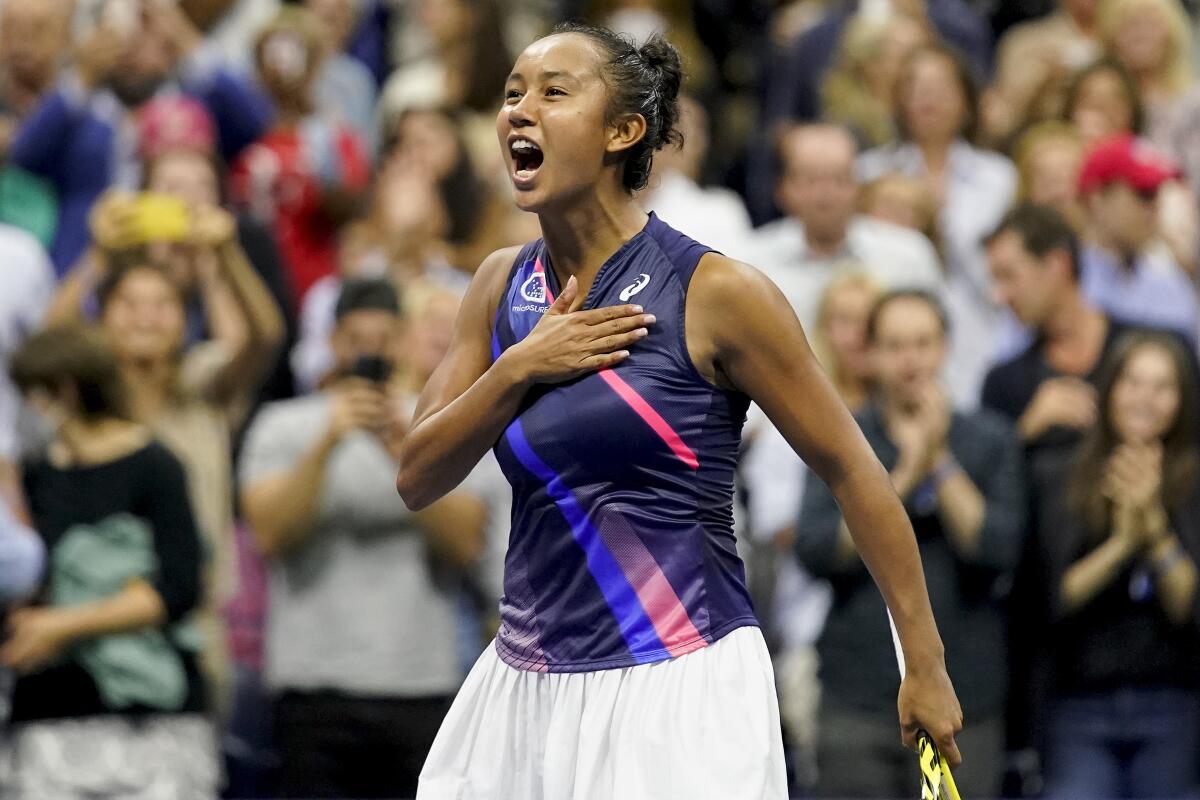 Leylah Fernandez reacts after defeating Aryna Sabalenka during the semifinals