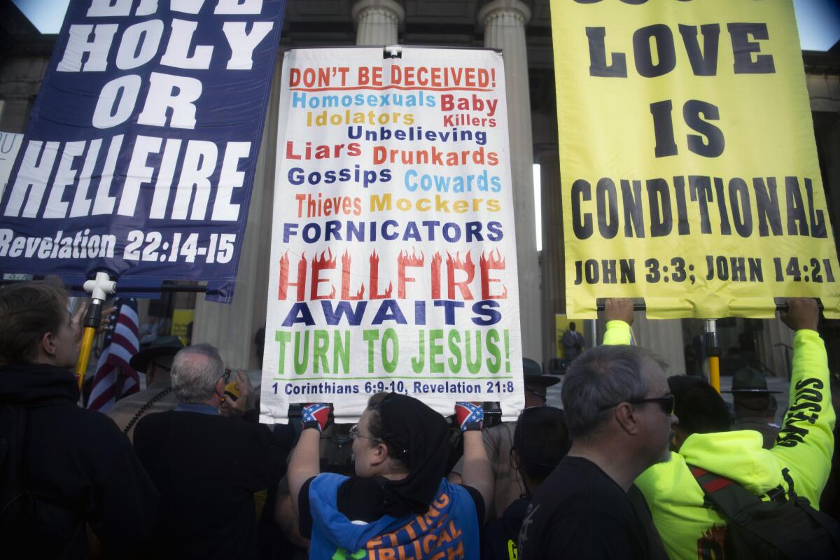 Attendees congregate at a rally against gender-affirming care.