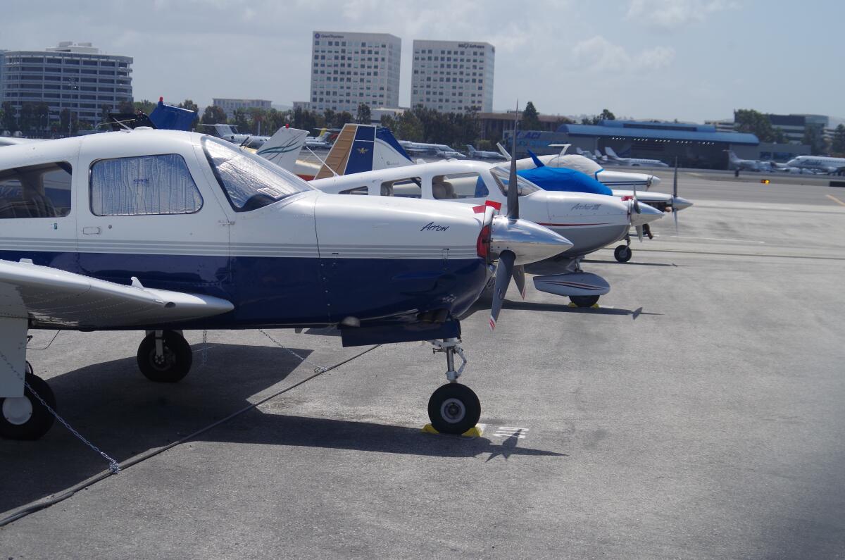 Private planes parked at John Wayne Airport. The airport will be offering free COVID-19 testing kits starting Wednesday.
