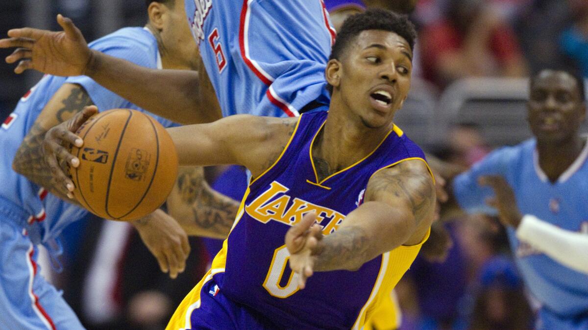 Lakers guard-forward Nick Young underwent surgery to repair a torn ligament in his right thumb.