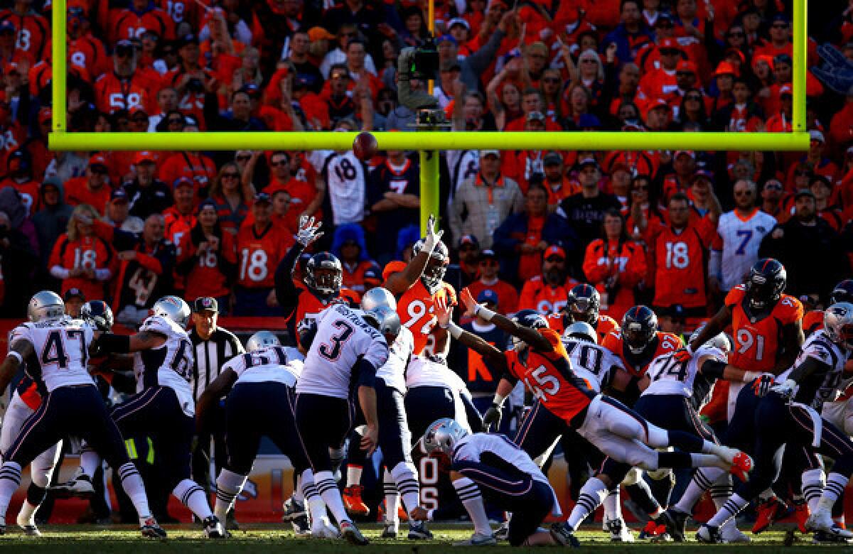 New England's Stephen Gostkowski kicks an extra point during Sunday's AFC championship loss to Denver. The NFL's competition committee is looking at possibly getting rid of the extra point.