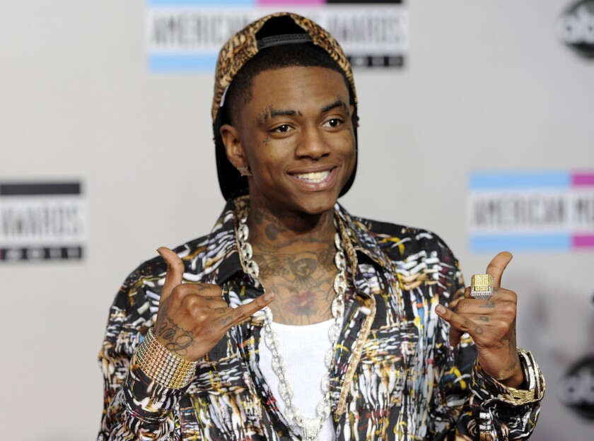 Los Angeles police say they arrested Soulja Boy, whose real name is DeAndre Cortez Way, on Dec. 15 on a probation violation after officers found firearms in his home. He was charged Monday.