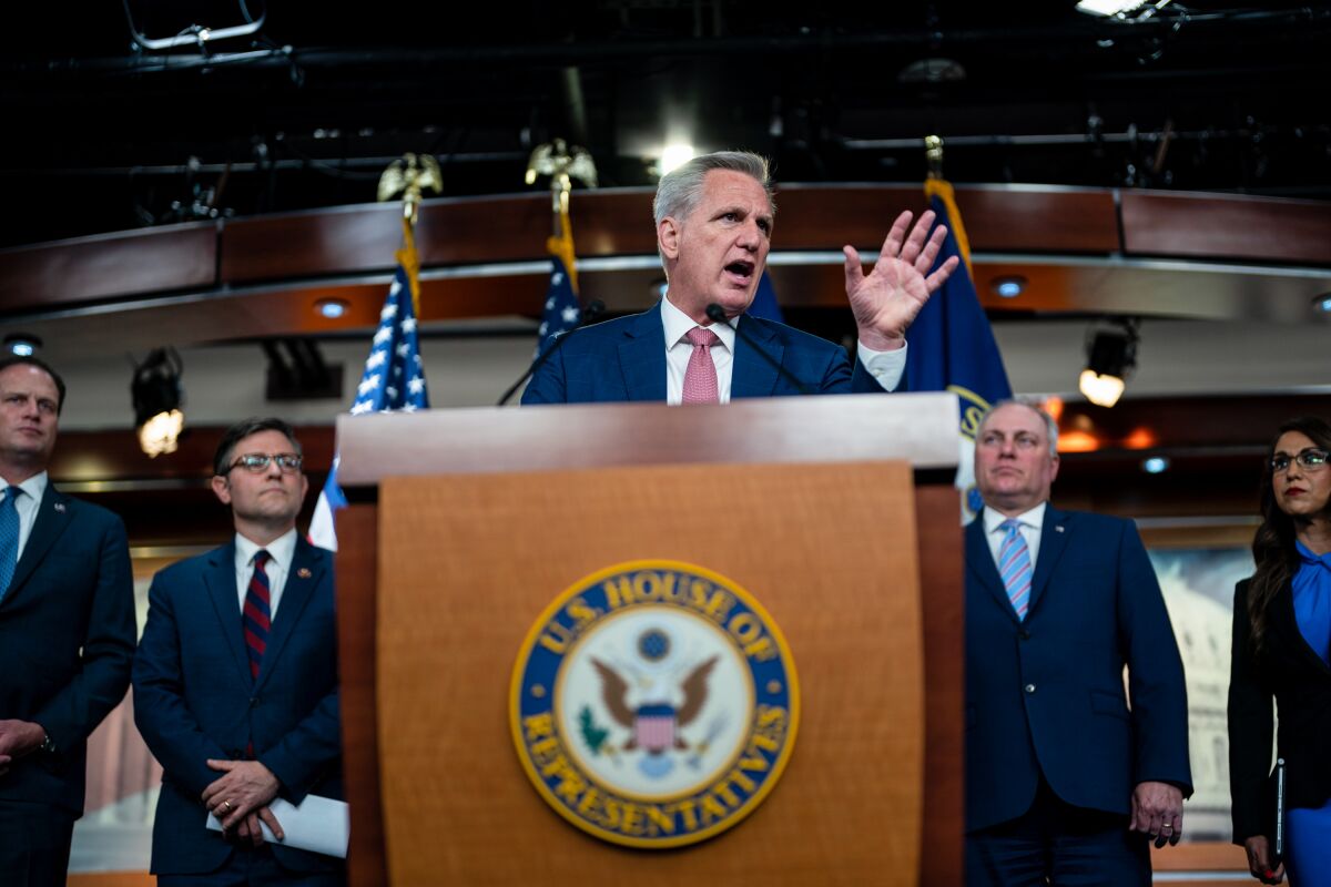 Kevin McCarthy stands at a lectern.