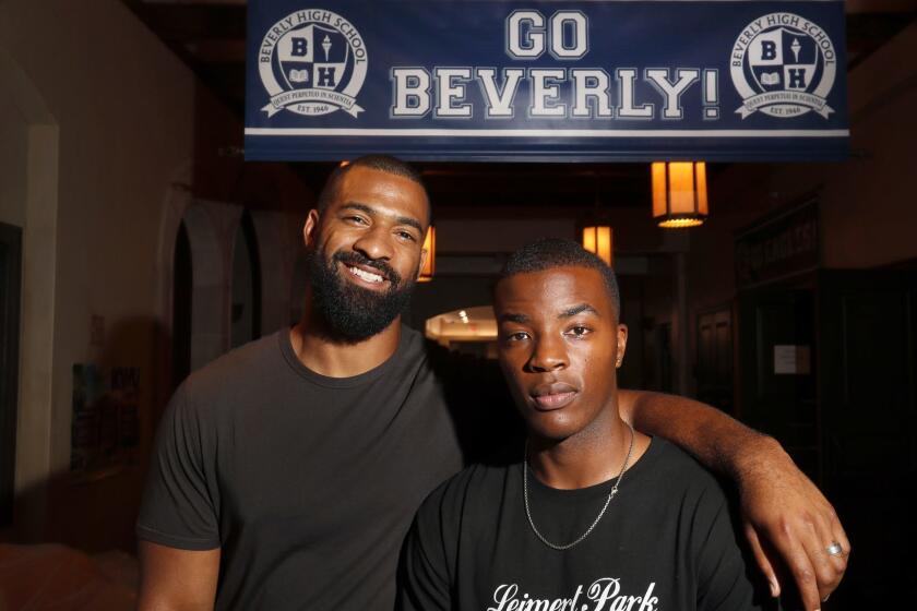 BURBANK, CA-AUGUST 29, 2018: Spencer Paysinger, left, and actor Daniel Ezra are photographed on the set of the CW show, "All American," at Warner Bros. Studios in Burbank. Ezra plays the role of Spencer James, based on the real life story of Paysinger, a professional football player from South Los Angeles who played at Beverly Hills high school. (Mel Melcon/Los Angeles Times)