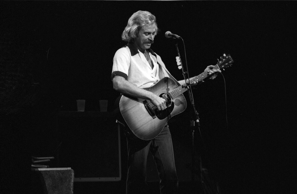 Jimmy Buffett is shown in the 1970s, the decade in which his career ignited. Buffett died Friday at the age of 76.