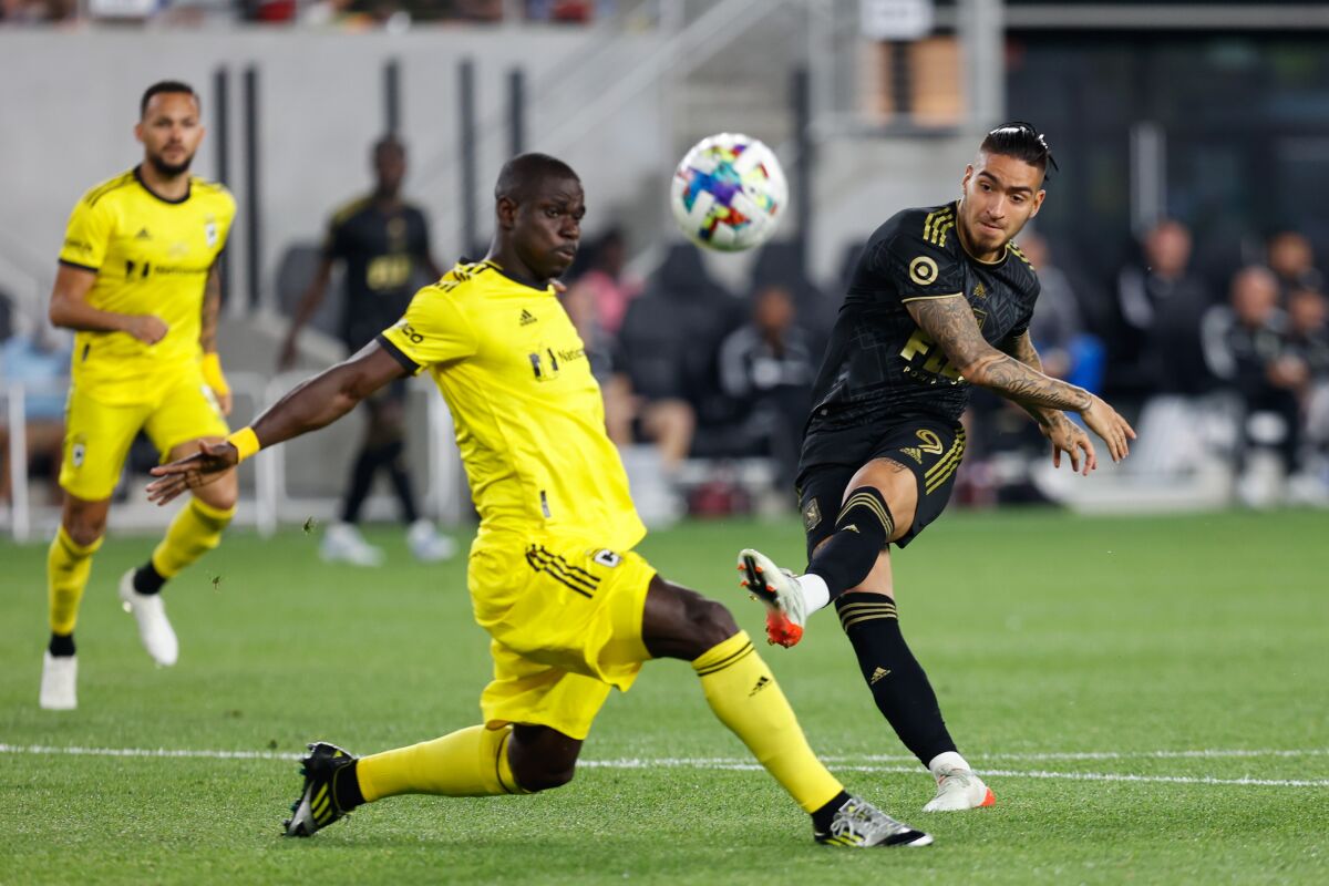 LAFC forward Cristian Arango shoots during the second half.