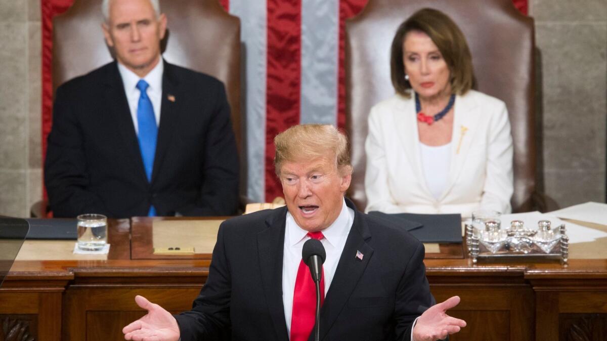 President Trump delivers his State of the Union address as Vice President Mike Pence and House Speaker Nancy Pelosi listen.