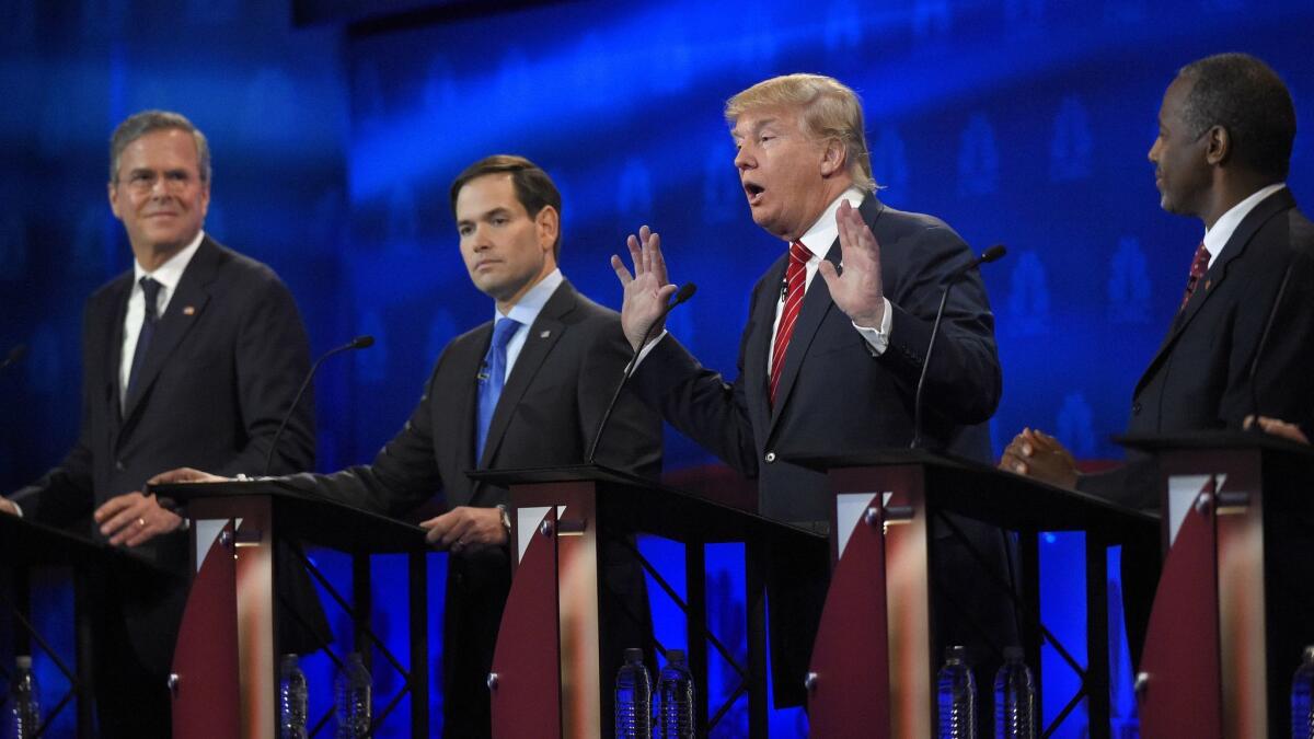 Republican presidential candidates Jeb Bush, from left, Marco Rubio, Donald Trump and Ben Carson debate in Boulder, Colo., in October 2015.