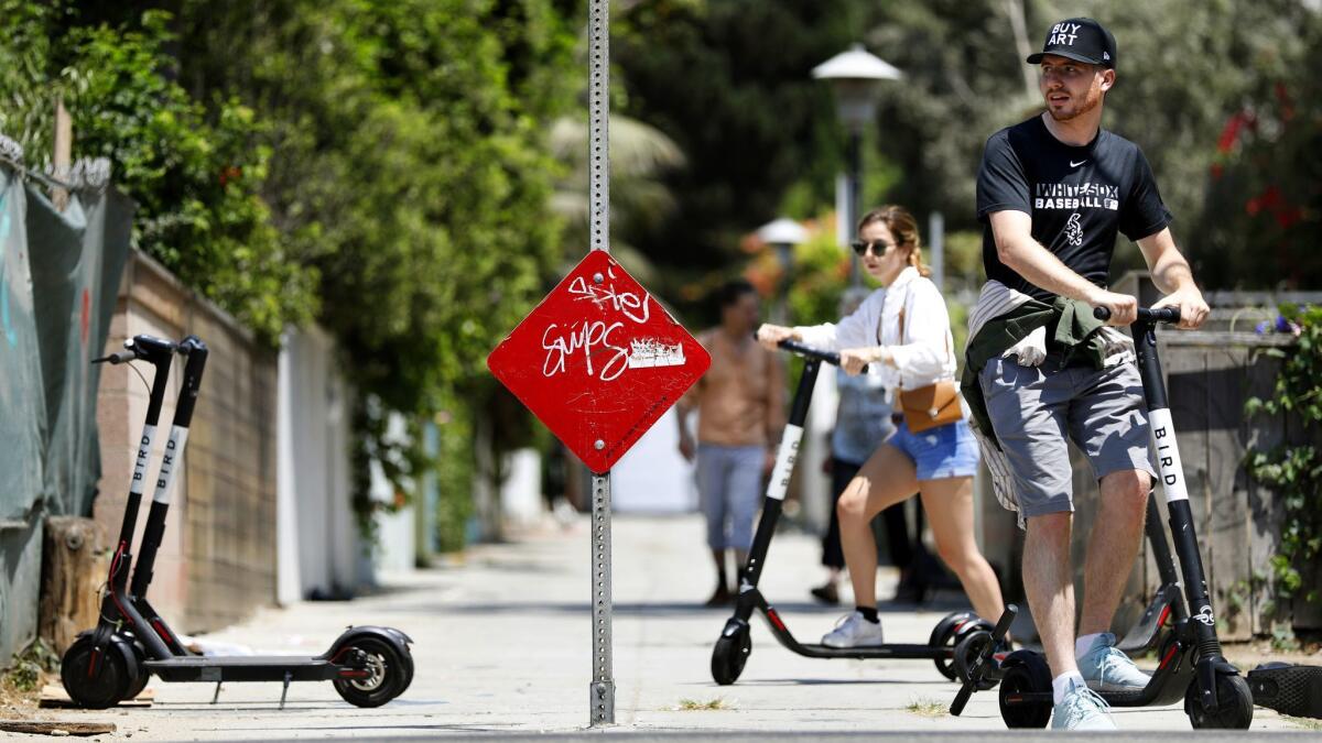 The Los Angeles City Council approved a set of rules Tuesday that will allow electric scooter companies to legally operate in the city, and will impose requirements on parking, riding and renting the devices.
