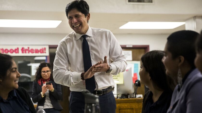 State Sen. Kevin De León (D-Los Angeles) speaks with students at Garfield High School on April 20 in Los Angeles.