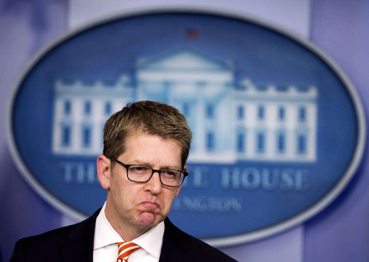 White House Press Secretary Jay Carney reacts to a reporter's question at a news briefing Monday.