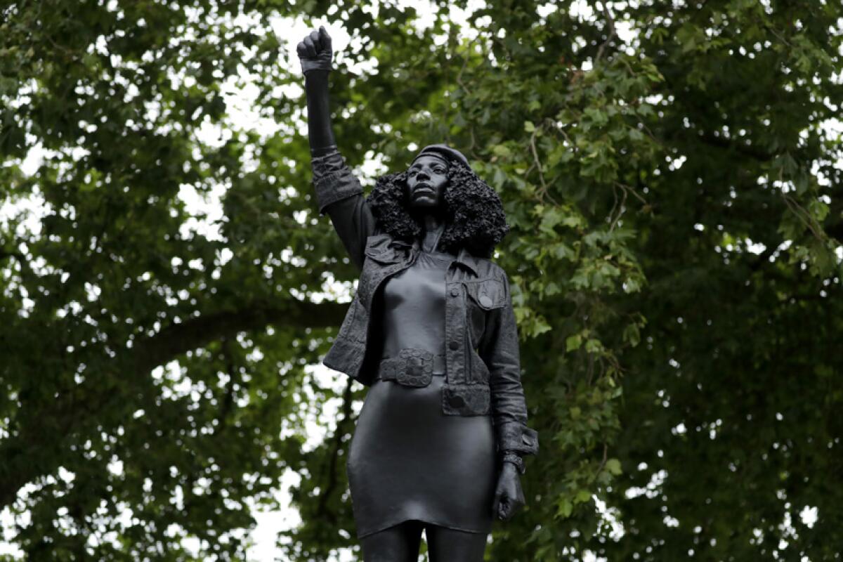 A statue titled “A Surge of Power (Jen Reid)” in Bristol, England.