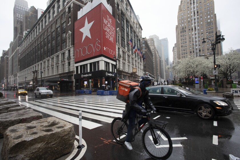 Furloughed employees from Macy's, shown, will continue to receive health coverage.